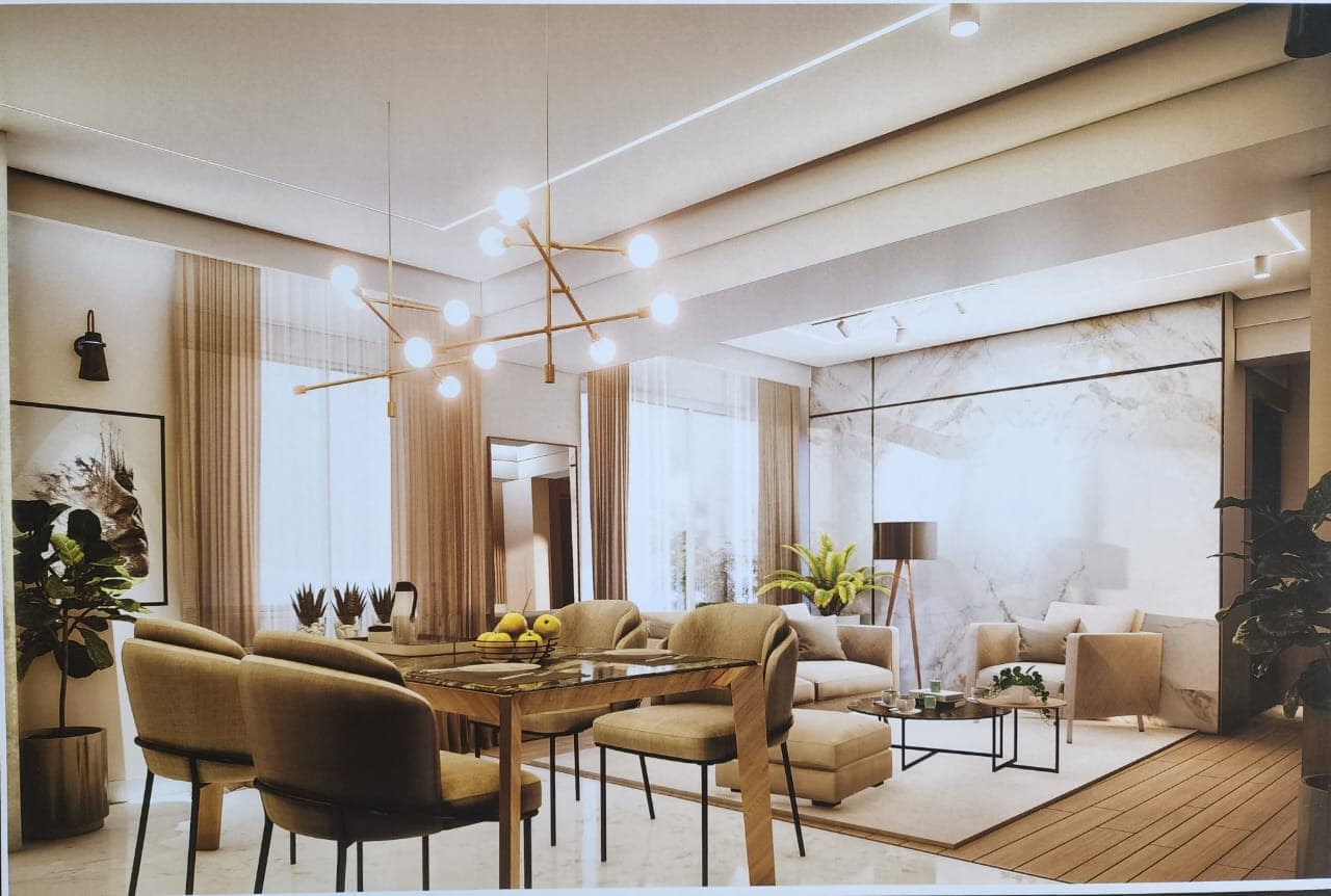 Living and dining room of an A.S.G. residence, with a full-height marble feature wall and a sculptural pendant over the dining table